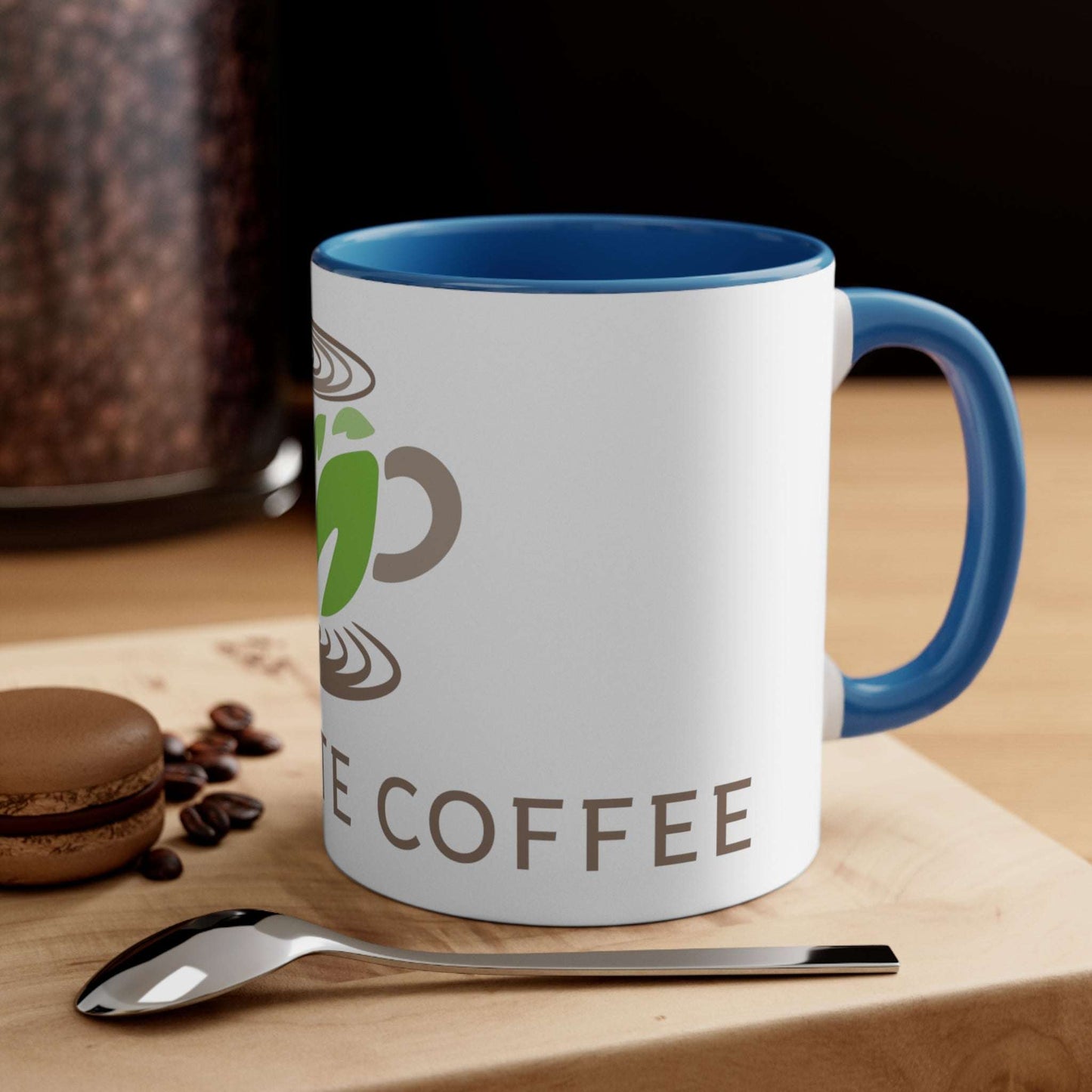 11oz  Blue Accented Marquette Coffee Logo Gift Mug With Kitchen backdrop